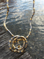 gun-metal-gold-snake-necklace